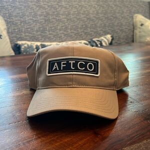 Brand new Aftco hat in Oak Khaki color